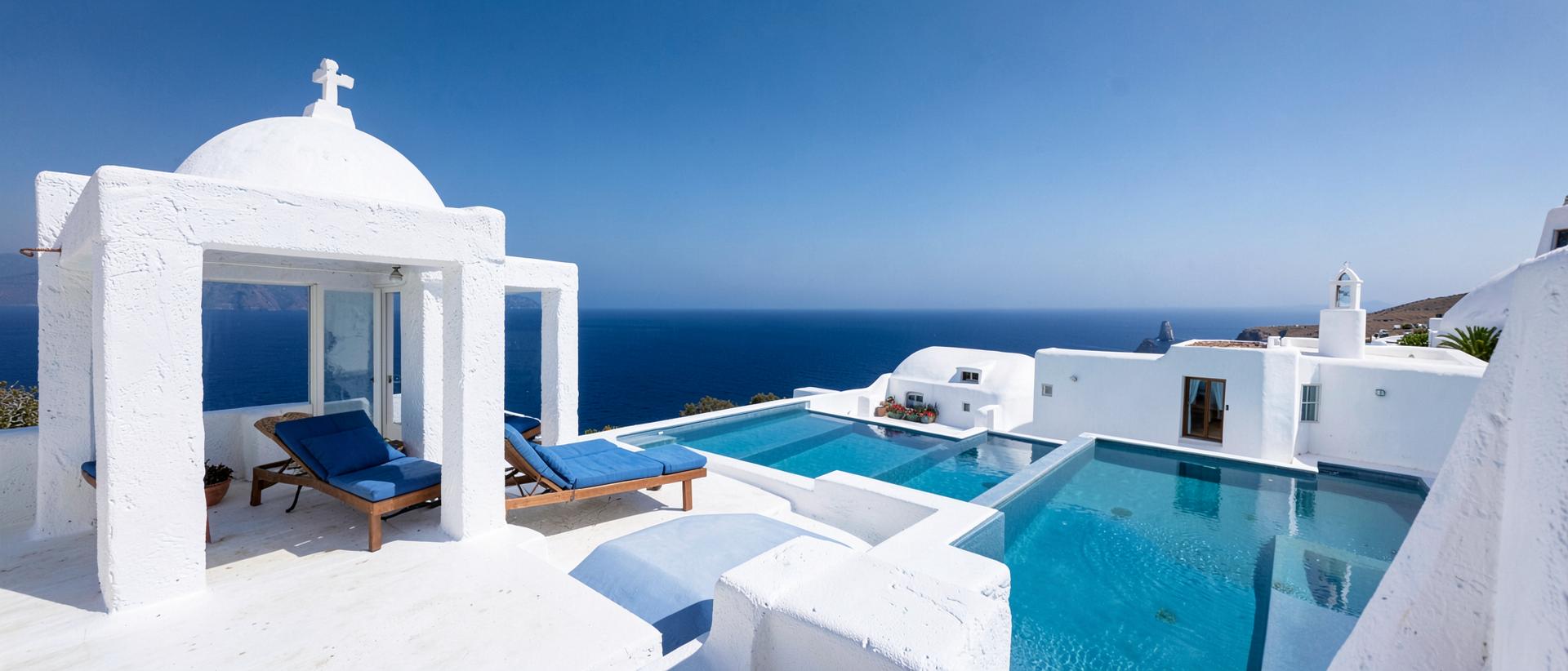 Panoramic view of the villa terrace, stone pavilion and infinity pool above the sea